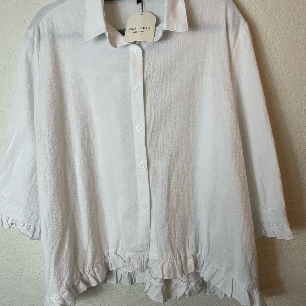 Fits like 2x Cellabie White Ruffle Hem Button-Front Blouse
